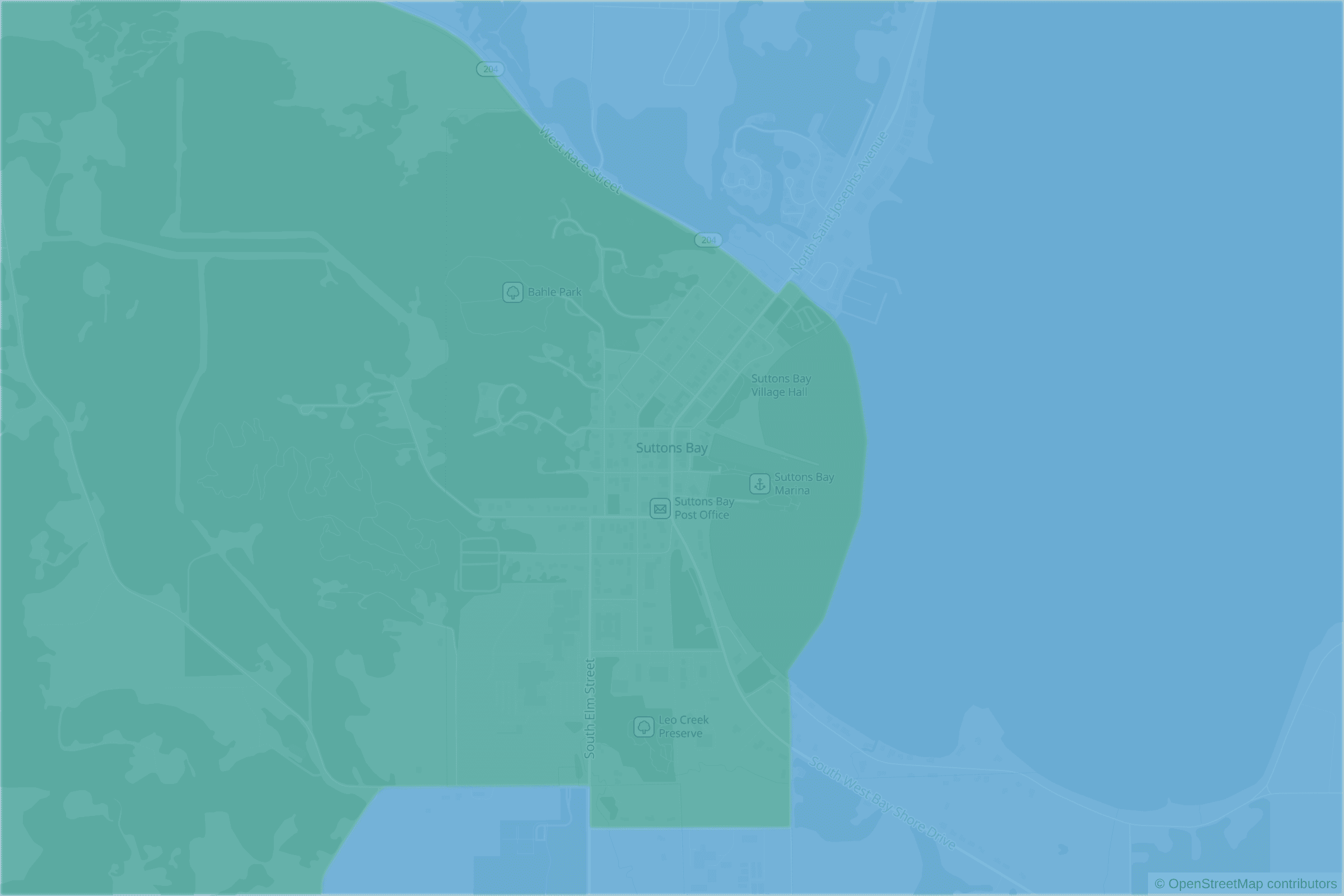 Map of central Suttons Bay, MI and the blocks around it, each census tract shaded by its neighborhood grade, A to F