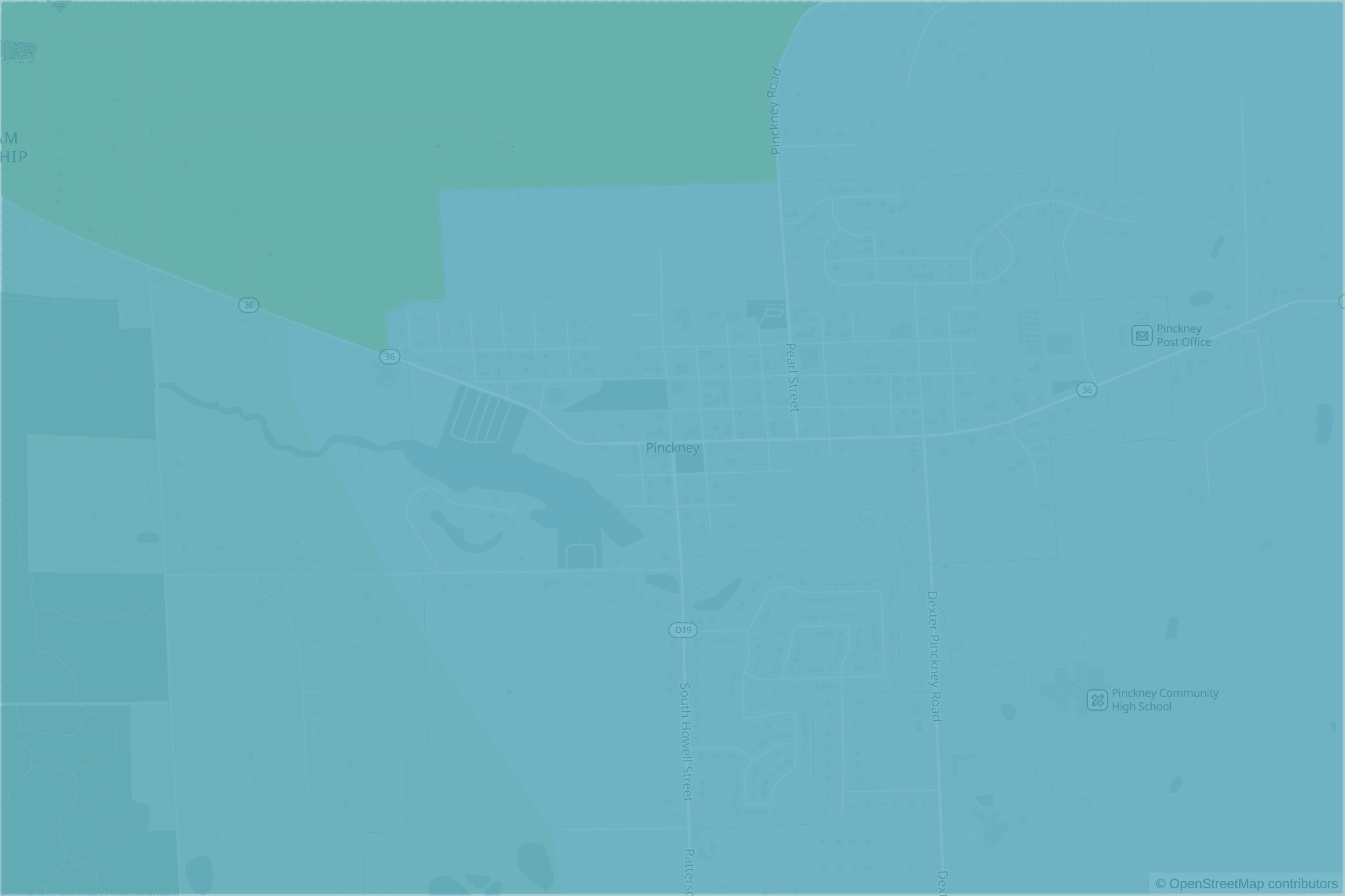 Map of central Pinckney, MI and the blocks around it, each census tract shaded by its neighborhood grade, A to F